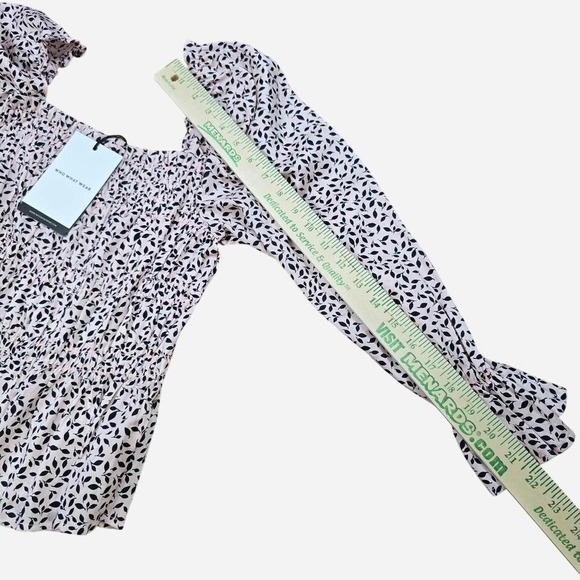 What not to wear pink and black floral off?The shoulder top size small - Picture 5 of 5